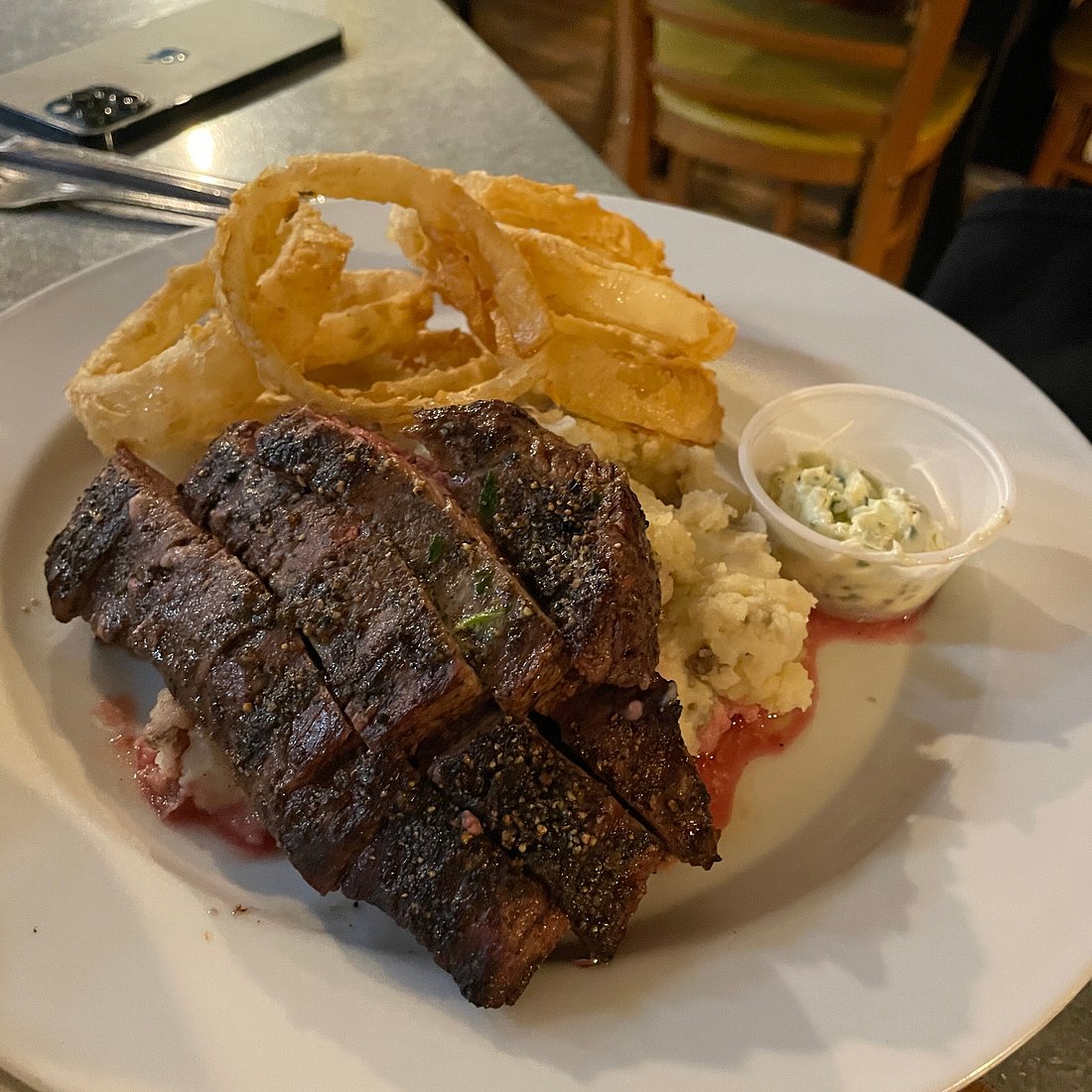 Kool Beanz Cafe signature dishes The menu is written on a chalkboard and changes daily. Staple dishes include Blackened Grouper, Tuscan-style Pork, and creative fish preparations.